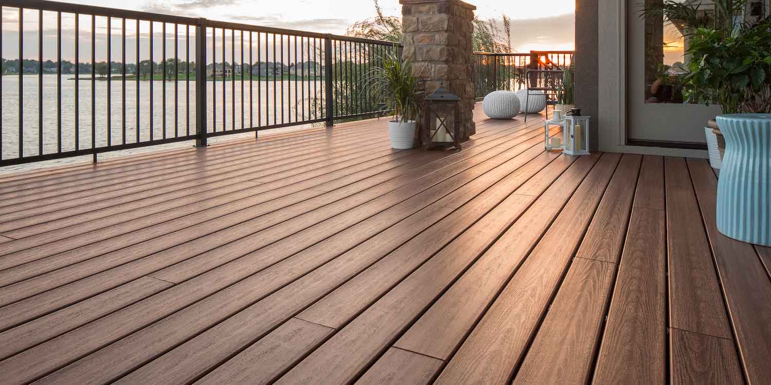 Photo of Armadillo composite decking with sunset in background