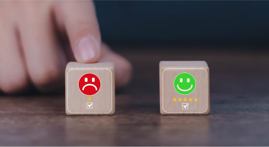 Side-by-side comparison of bad user experience website and good user experience, represented by blocks with reviews and sad/happy faces