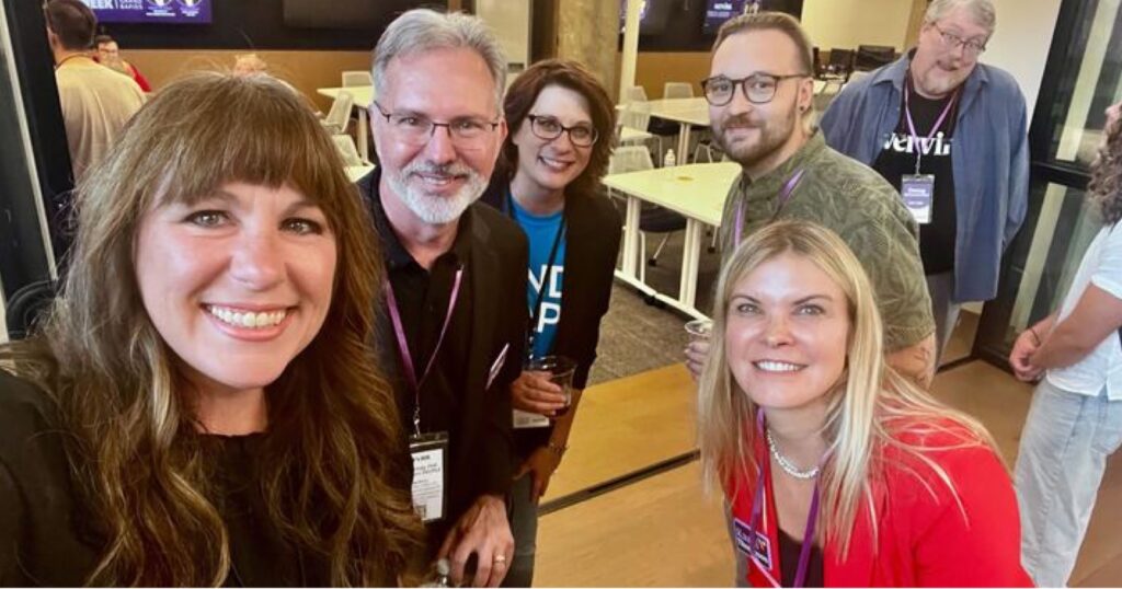 Attendees networking at Vervint Bites, Brews & Banter event in Grand Rapids