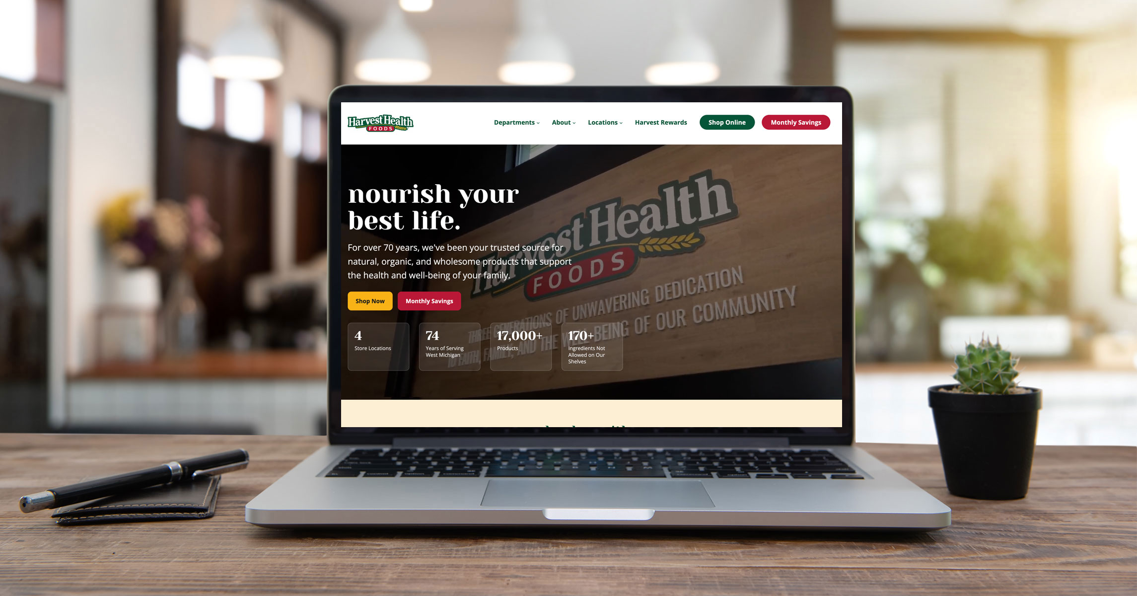Harvest Health website displayed on a laptop sitting in an office setting